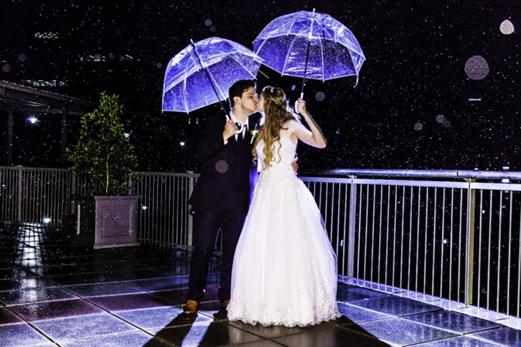 Get beautiful wedding photos even in the rain with Ryan Clark Photography!